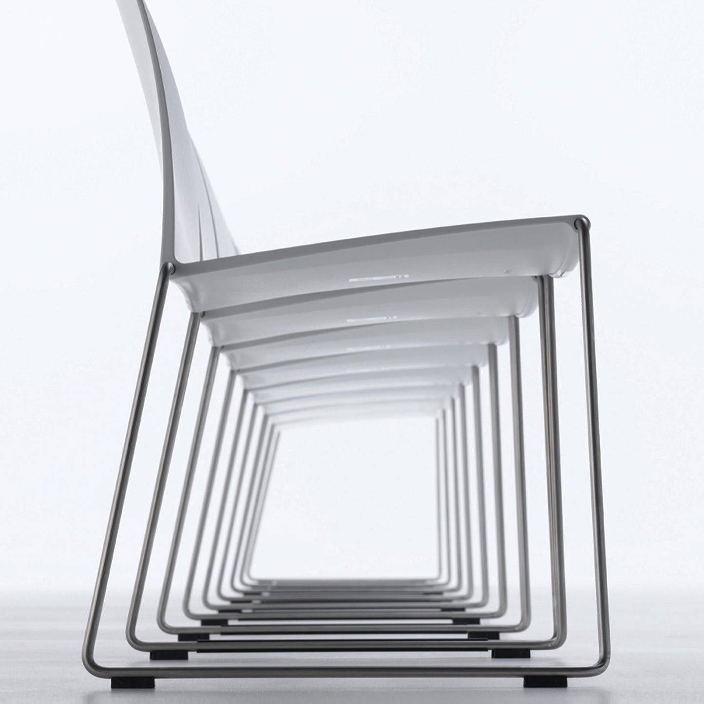 M1 Dining Chair – Stackable Indoor/Outdoor, Recyclable Plastic & Steel by MDF Italia