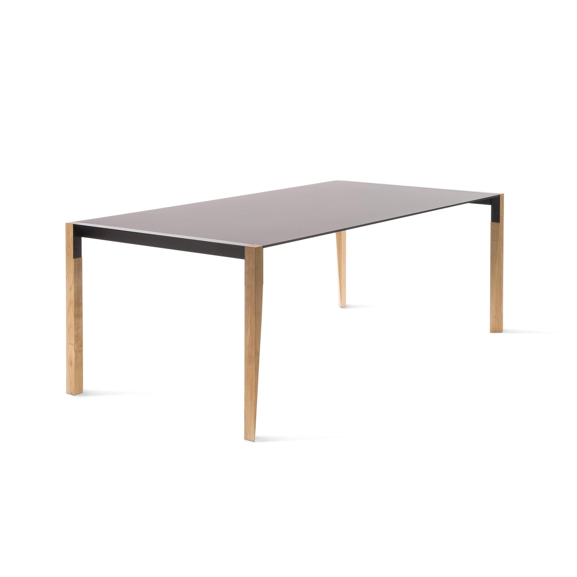 Extendable Dining Table with Sculptural Dynamic Legs – Fenix NTM Top Contemporary Statement Piece