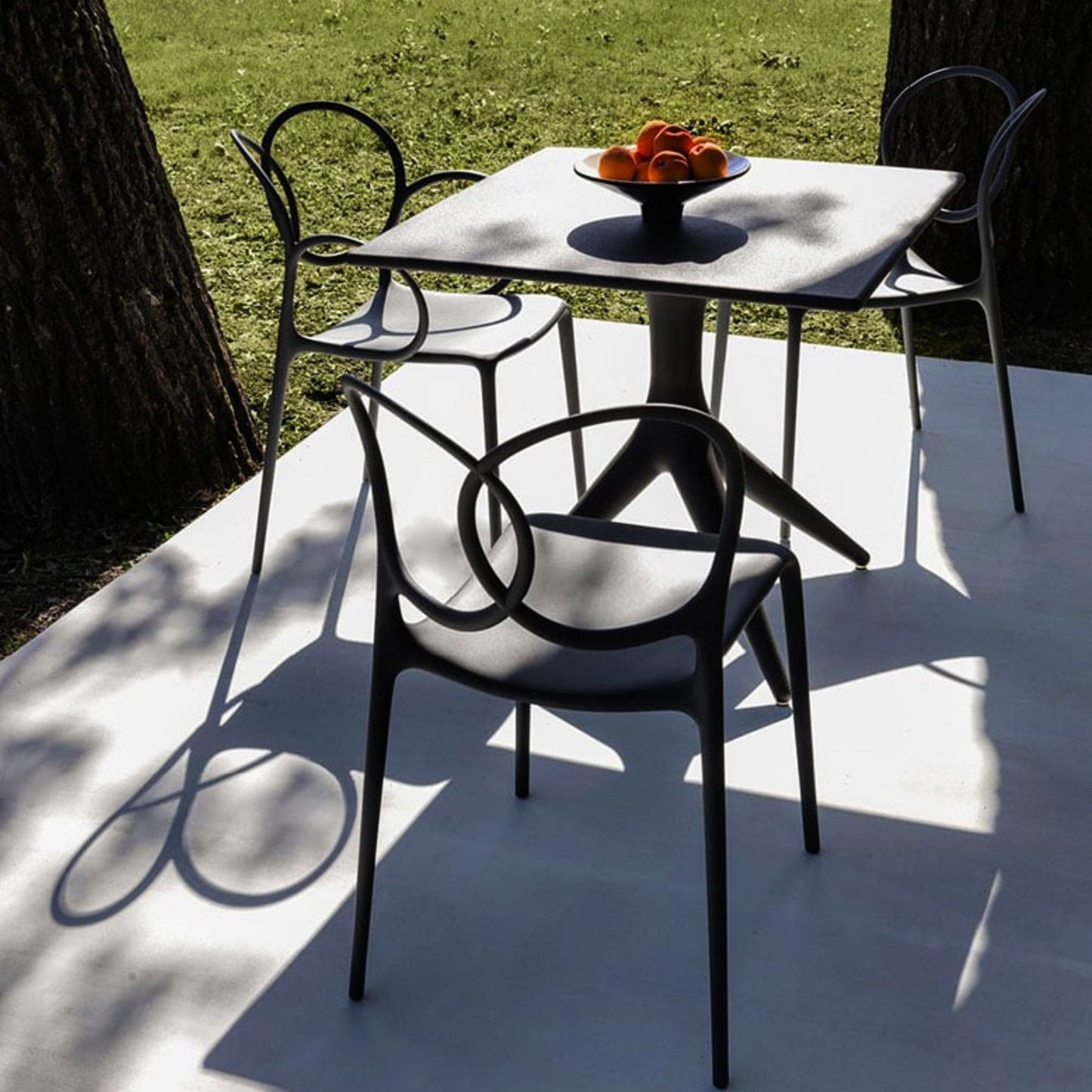 Sissi Dining Chair – Sculptural Loop Backrest Polypropylene Monobloc by Driade