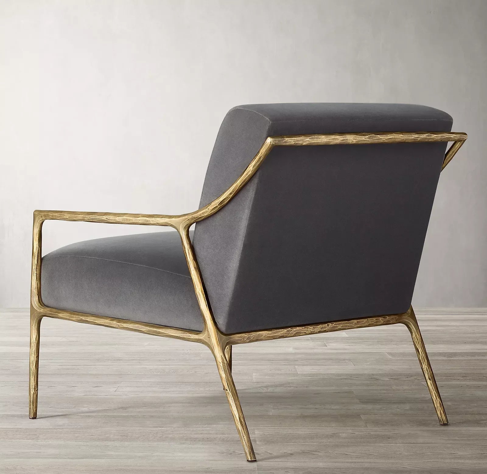 Thaddeus Slope Arm Chair – Hand Forged Metal Statement Piece