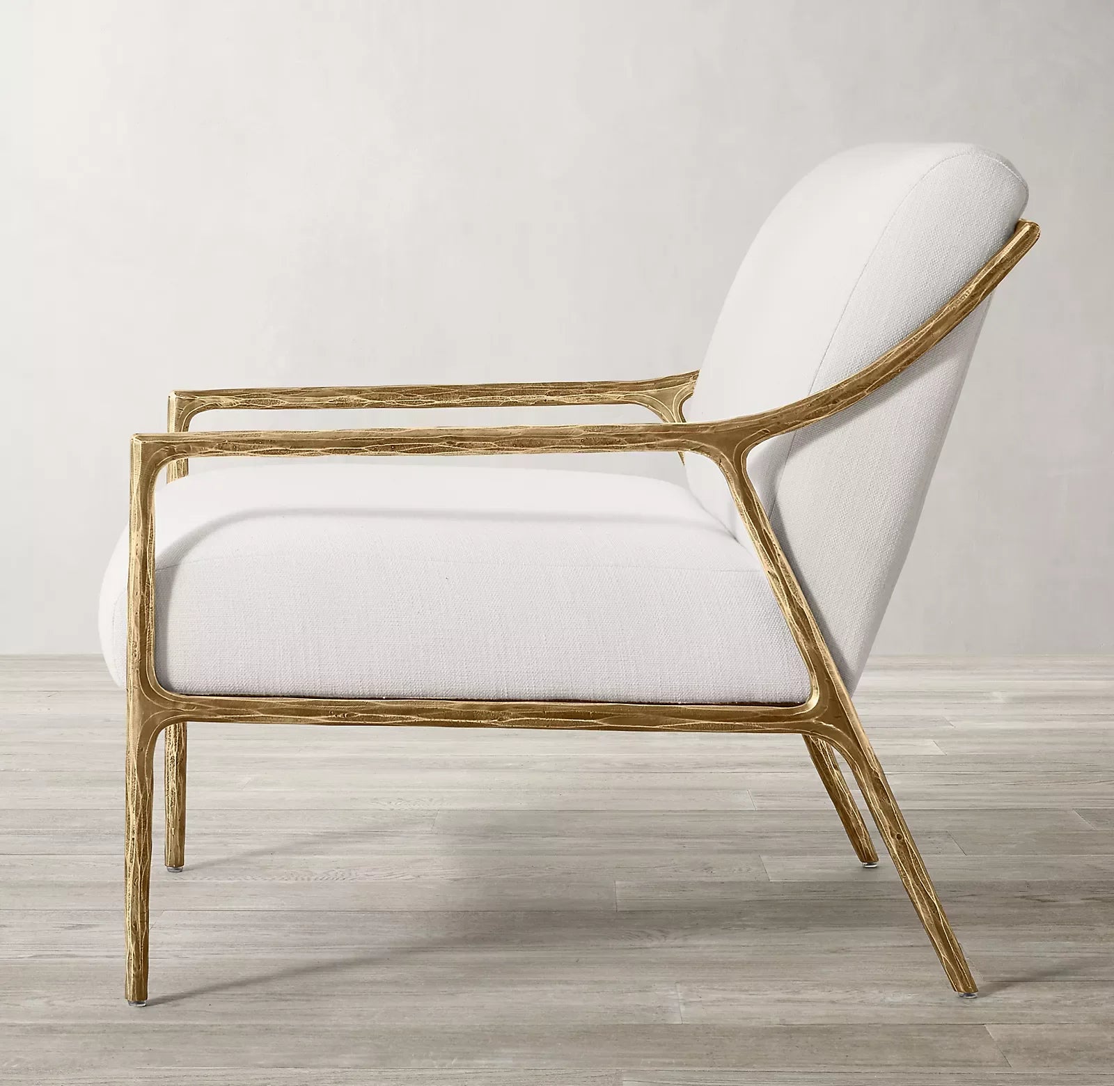 Thaddeus Slope Arm Chair – Hand Hammered Metal Statement Piece