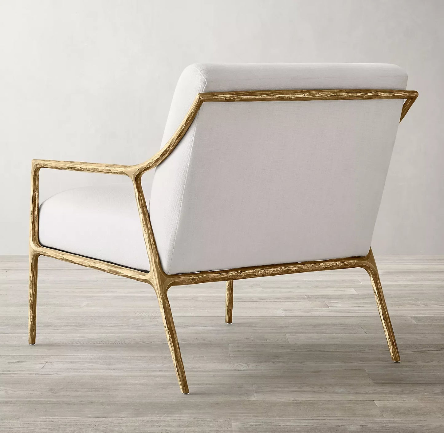 Thaddeus Slope Arm Chair – Hand Hammered Metal Statement Piece