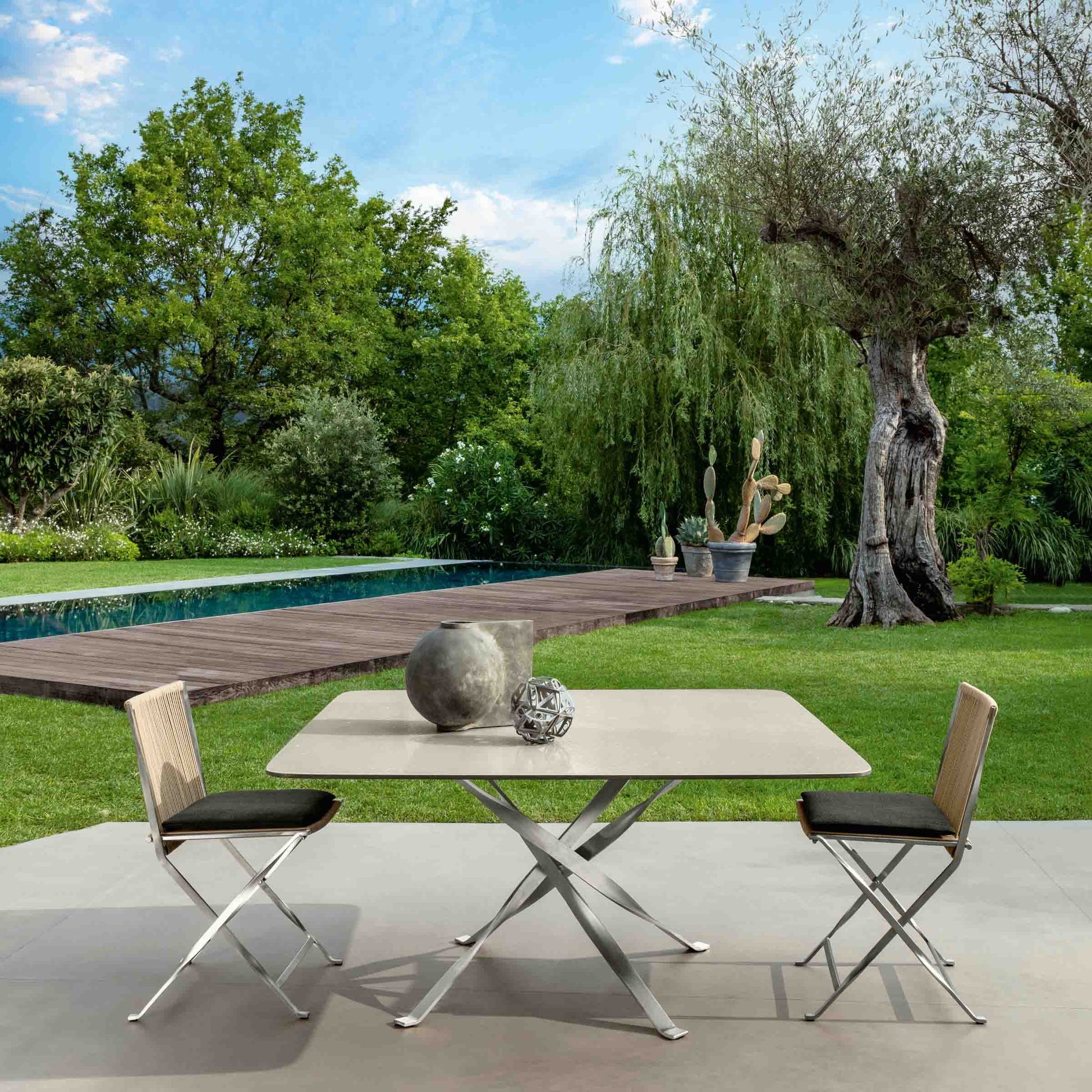 Outdoor Dining Table – Sculptural Steel Statement Piece in Beige