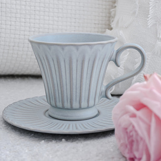 Pale blue teacup and saucer